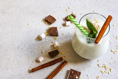 Cold drinks in small bottles. Cherries and lemon lemonade or cocktail. Stock Photos