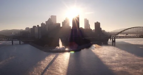 Cold Early AM At The Point In Pittsburgh With Silhouette Of City And Sun Rising  Stock Footage 100033308