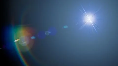 Cold flare overlay sun light len effect on black background. Blue starburst w Foto stock