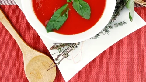 Cold fresh diet tomato soup with basil Video stock 88923563