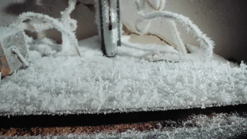 Cold frost coating on console edges and shelves. Close proximity view of frozen 스톡 동영상 347079495