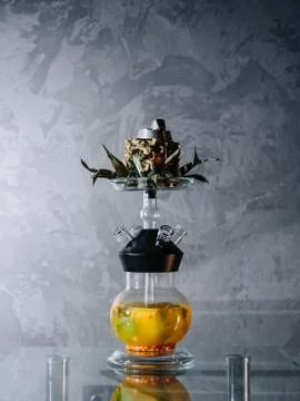 Cold fruit hookah based on juice and a half of a pineapple instead of shisha  Stock Photos