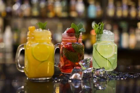 Cold fruit tea with ice Фото
