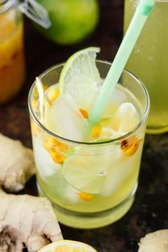 Cold ginger lemonade with lime and lemon. Stock Photos