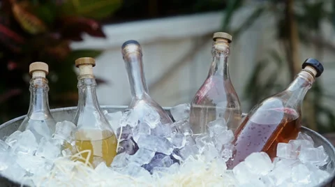 Cold glass bottles in the ice Stock Footage 39454831