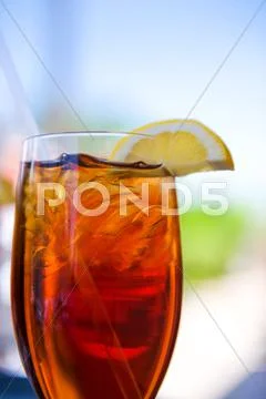 Cold glass of iced tea Stock Photos