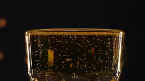 Cold green glass refrigerated wheat or lager beer, condensation bubbles slowly Stock Footage 331677516