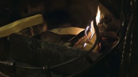 Cold hands warm by the fireplace. A warm cosy fire, a burning fire in the Stock Footage 70690783