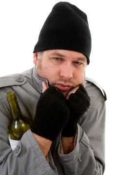 Cold homeless tramp with empty bottle Foto stock
