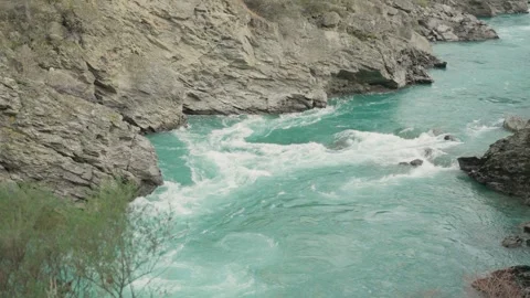 Cold ice water river or stream flowing strong powerful current or rapid Stock Footage 289416347