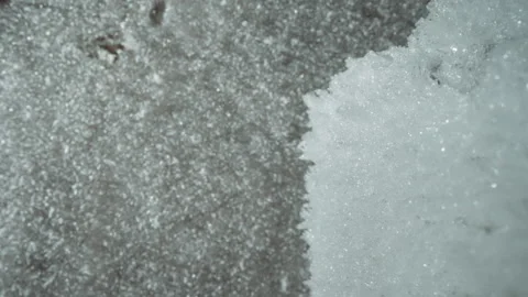 Cold icy patch meets rugged city sidewalk details. Chilly icy section adjacent Video stock 347086252