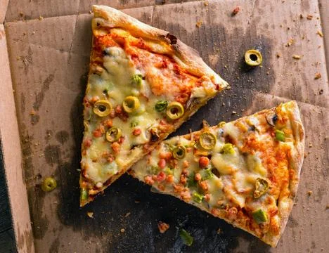 Cold Leftover Pizza Stock Photos