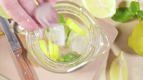 Cold lemonade in the decanter on the table Stock Footage 91325473