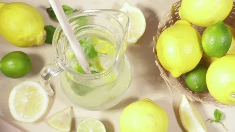 Cold lemonade in the decanter on the table Stock Footage 91325531
