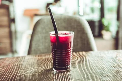 Cold lemonade in a glass on the table Stock Photos