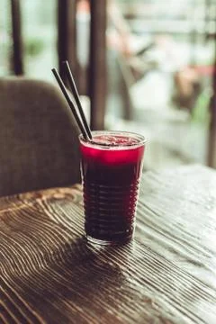 Cold lemonade in a glass on the table Stock Photos