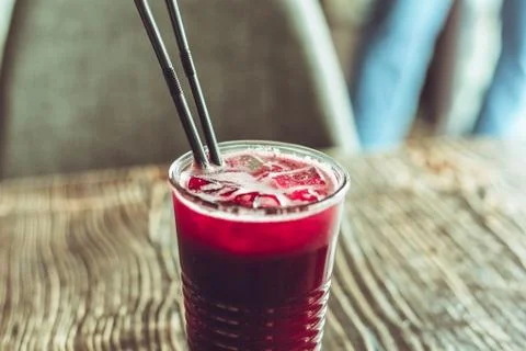 Cold lemonade in a glass on the table Stock Photos