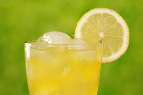 Cold lemonade with ice cubes Stock Photos