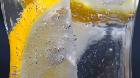Cold lemonade mojito drink slice of lemon with mineral bubbles. Stock Footage 117713639