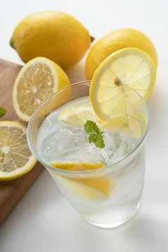 Cold lemonade on a white background Stock Photos