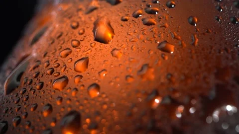 Cold light beer with bubbles in a glass and dripping condensate drops. Alcohol Video stock 161968897