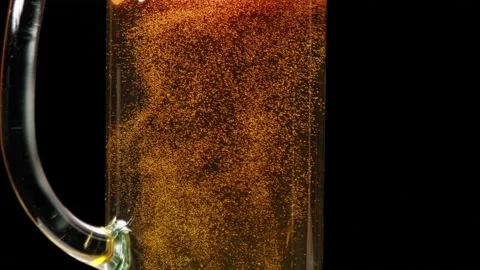 Cold light beer in a glass with bubbles. Beer close-up. Video stock 162806701