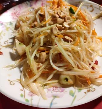 Cold mango salad with peanut mixed in spice and sour juice Stock Photos