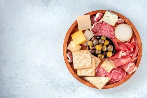 Cold meat and cheese board, shot from above with copy space Foto stock