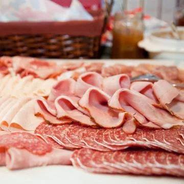 Cold meat platter on a buffet table Stock Photos