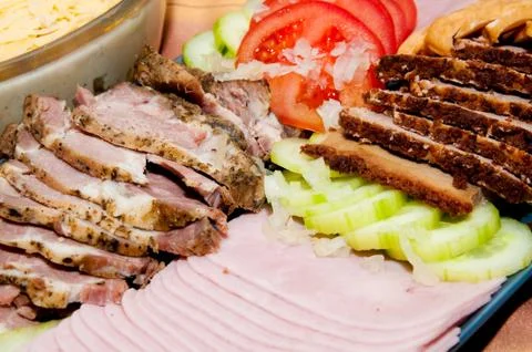 Cold meat with tomatoes Stock Photos