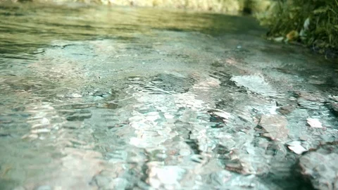 Cold mountain river flows among stones. cold and clear, turquoise river . Stock Footage 123476997