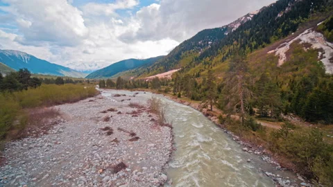 Cold mountain river with raging stream Stock Footage 97594744