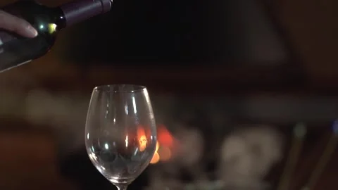 Cold night with wine around a fireplace Stock Footage 246157488
