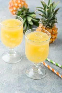 Cold pineapple cocktail Stock Photos