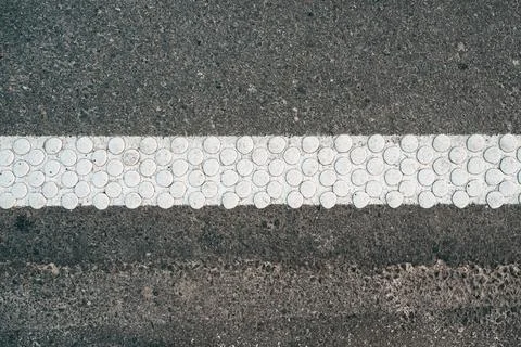 Cold plastic structured stripes with dot pattern for road surface marking a.. Stock Photos