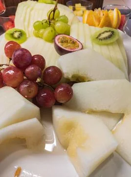 Cold plate with melon, grapes and assorted fruits Stock Photos