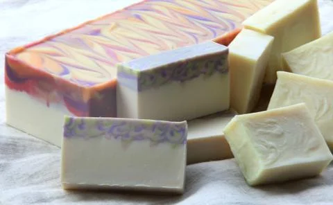 Cold process soaps on linen background 库存照片