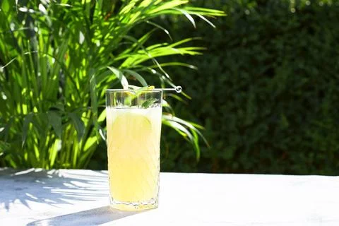 Cold refreshing cocktail of melon with ice and lime slices. Summer cocktails and Stock Photos