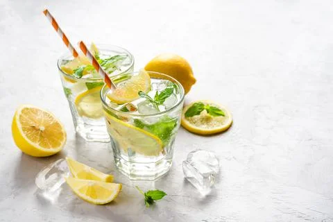 Cold refreshing lemonade or mojito. Stock Photos