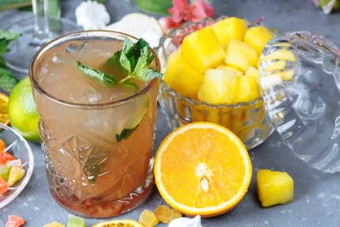 Cold refreshing pineapple cocktail with lime and mint for a hot summer day on Stock Photos