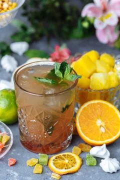 Cold refreshing pineapple cocktail with lime and mint for a hot summer day on Stock Photos