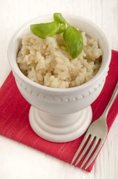 Cold risotto rice with basil Stock Photos