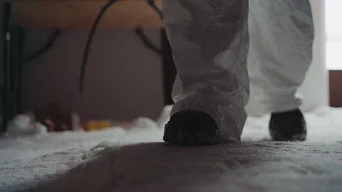 Cold search scene. Silent detective moves carefully across frozen surface Stock Footage 346470567