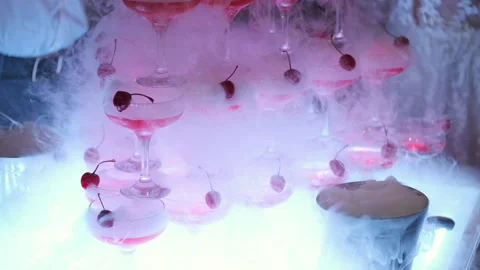 Cold smoke on the buffet table. Alcoholic beverages with cherries Stock Footage 130650300