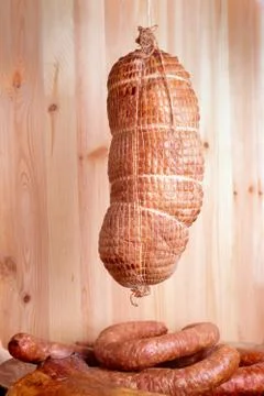 Cold smoked ham Stock Photos