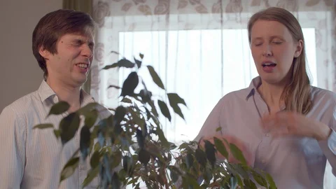 Cold sneezing couple Stock Footage 128899619