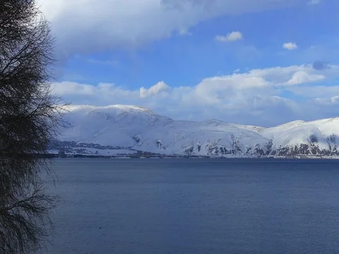 Cold Snow Mountains with Lake Stockbeeldmateriaal 73546973