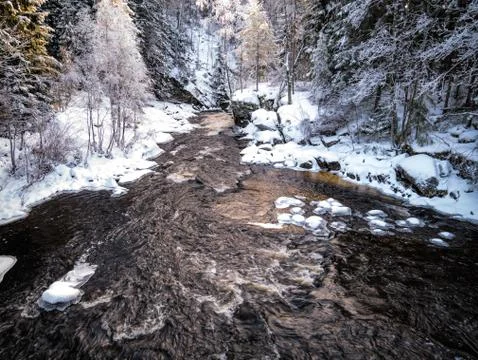 The cold snow winter river in evening light Stock Photos