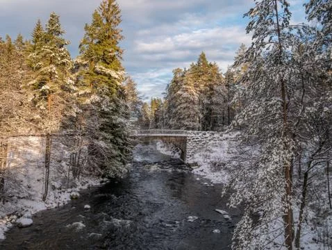 The cold snow winter river in evening light Stock Photos