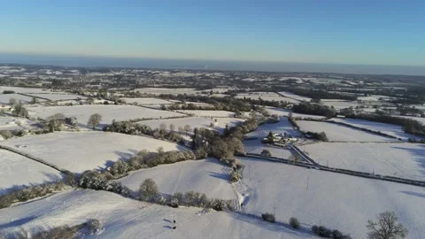 Cold snowy winter British patchwork farmland countryside rural scene Video stock 146523729